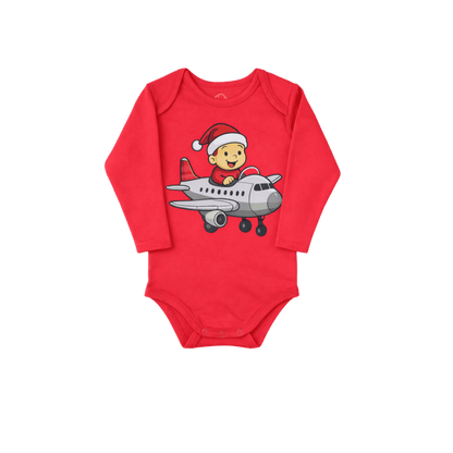 Red baby onesie with a cartoon character in a Santa hat on an airplane
