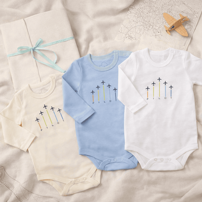 Long sleeve baby onesie with PILOT graphic, lifestyle view – Kumy Kids