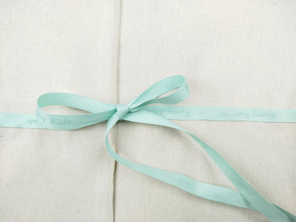 Kumy Kids gift wrapping tissue with ribbon detail