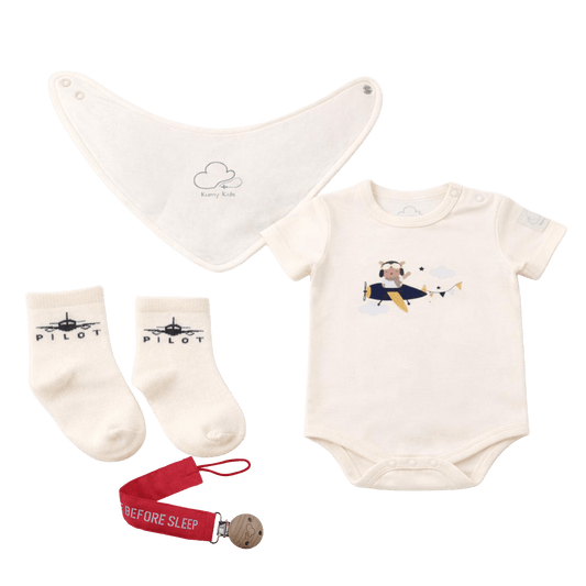 Baby clothing set with onesie, bib, socks, and pacifier clip