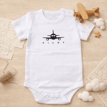 White short sleeve baby bodysuit with PILOT aviation print in lifestyle setting